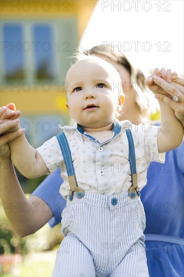 Mother with baby boy (12-17 months)