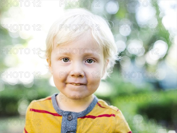 Portrait of boy (4-5) looking at camera