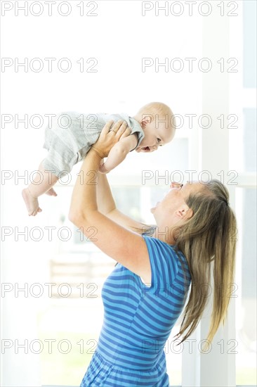 Mother playing with son (6-11 months)