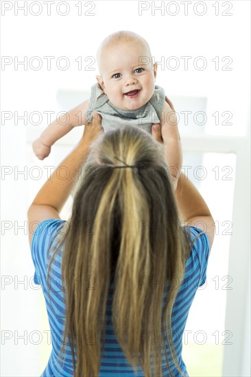 Mother playing with son (6-11 months)