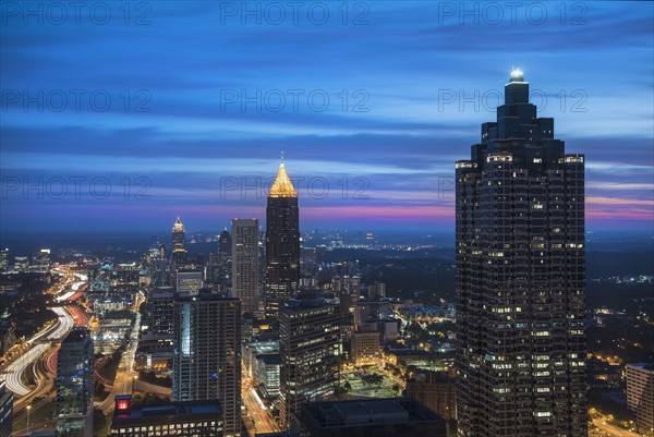 USA, Georgia, Atlanta, Cityscape with skyscrapers at dawn