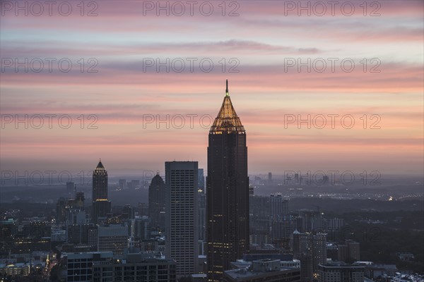 USA, Georgia, Atlanta, Cityscape with skyscrapers at dawn