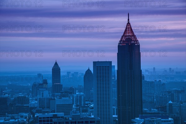 USA, Georgia, Atlanta, Cityscape with skyscrapers at dawn