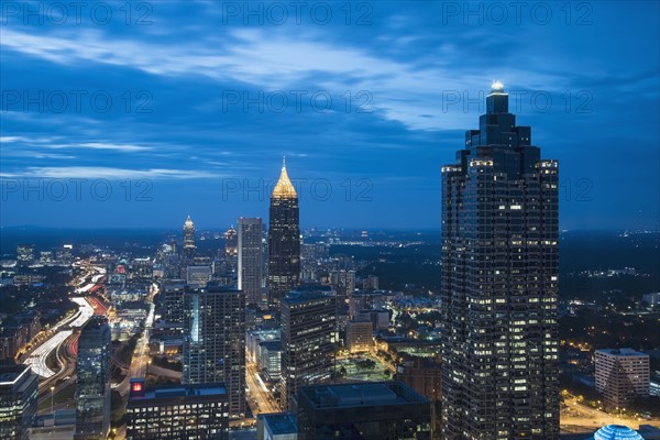 USA, Georgia, Atlanta, Cityscape with skyscrapers at dusk