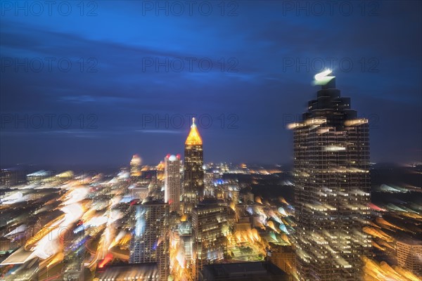 USA, Georgia, Atlanta, Blurred motion of cityscape at dusk