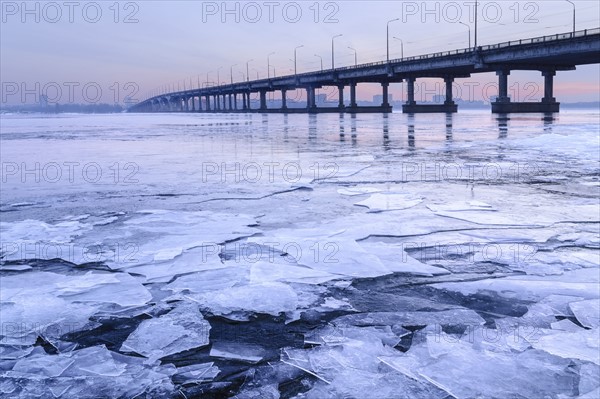 Ukraine, Dnepropetrovsk region, Dnepropetrovsk city, Bridge over frozen river