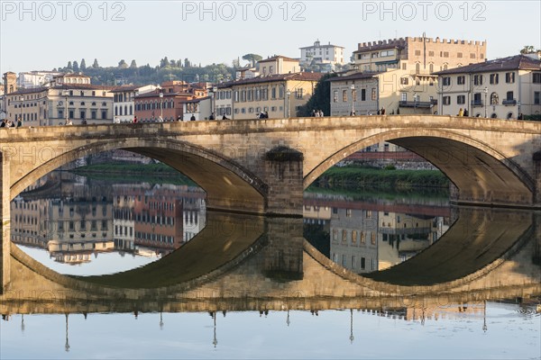 Italy, Tuscany, Florence, Cityscape reflected in Arno river