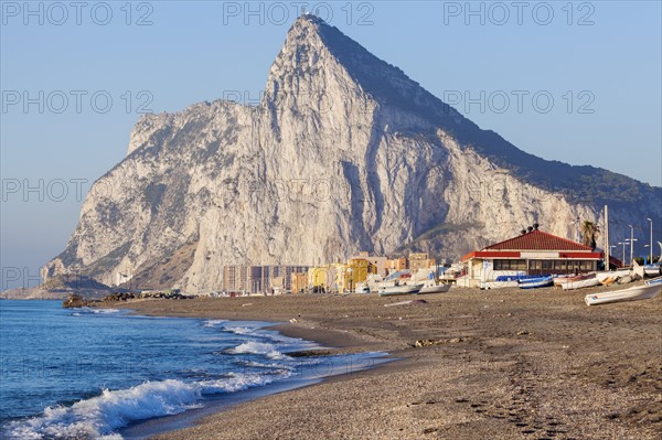 UK, Rock of Gibraltar with sandy beach in foreground