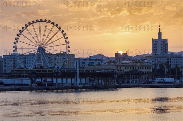 Spain, Andalusia, Malaga, Townscape at sunset