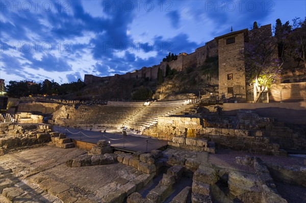 Spain, Andalusia, Malaga, Illuminated Roman Theater at dusk