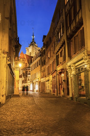 France, Grand Est, Colmar, Incidental people in long exposure with St Martin Church background