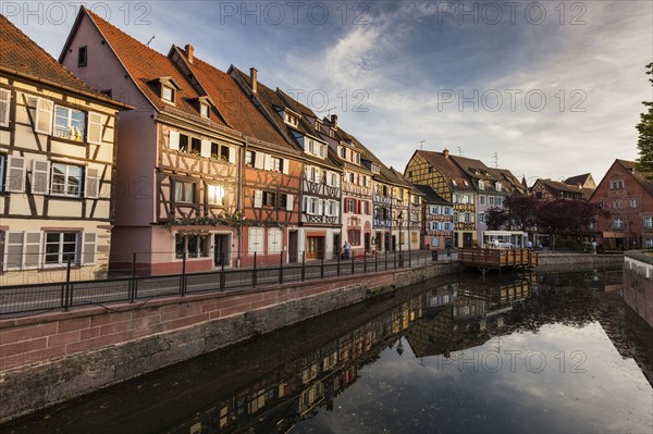 France, Grand Est, Colmar, Sky reflecting in water surface
