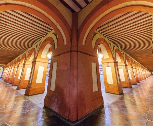 Spain, Andalusia, Cordoba, Plaza de la Corredera, Arcade in diminishing perspective