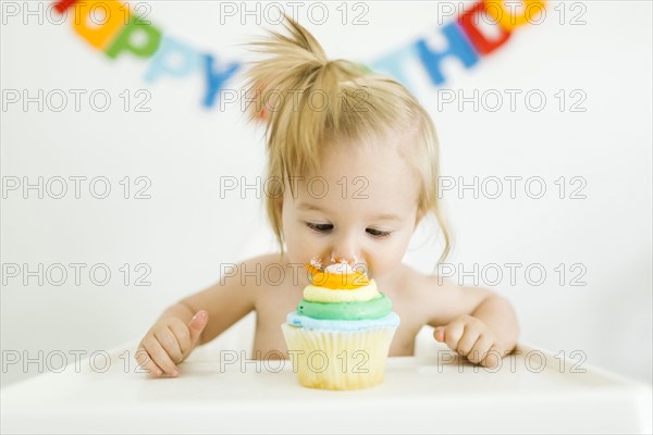 Baby girl (12-17 months) celebrating first birthday