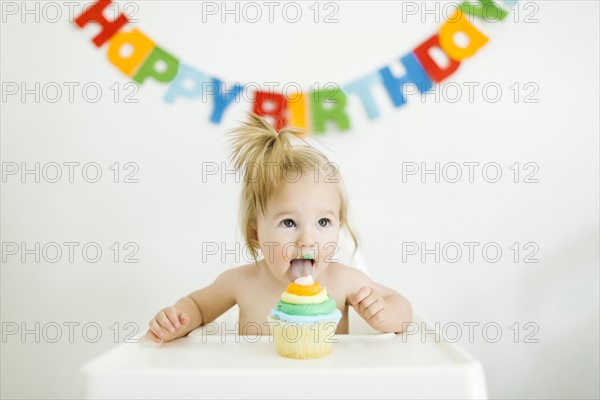 Baby girl (12-17 months) celebrating first birthday