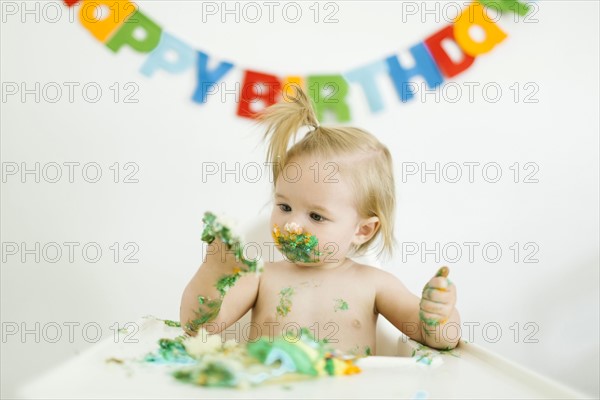 Baby girl (12-17 months) celebrating first birthday