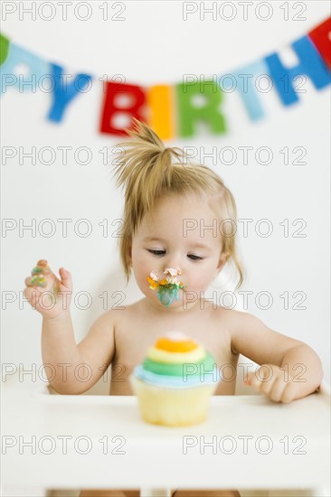 Baby girl (12-17 months) celebrating first birthday