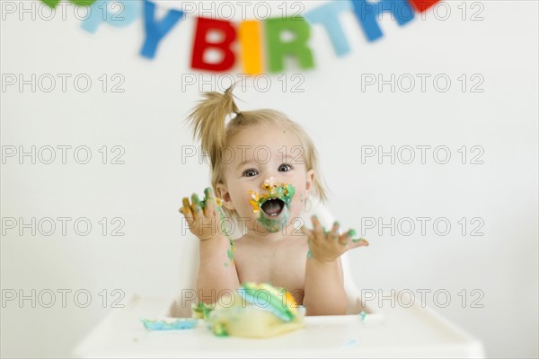 Baby girl (12-17 months) celebrating first birthday