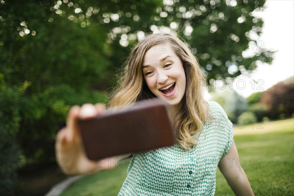 Beautiful woman taking selfie