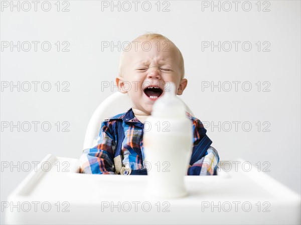 Studio shot of boy (12-17 months) crying