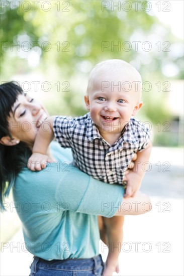 Mother playing with baby boy (12-17 months)
