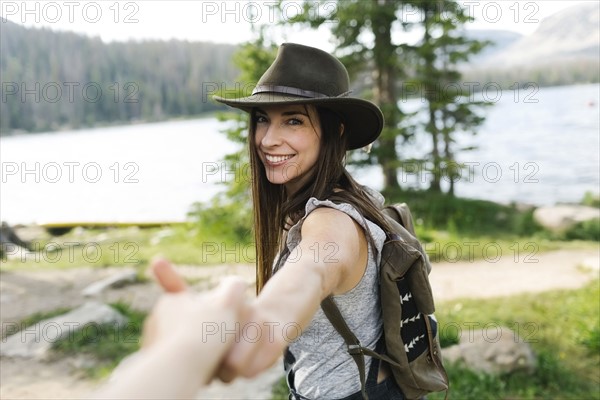 Couple hiking by lake