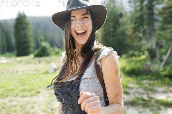 Portrait of woman hiking in forest