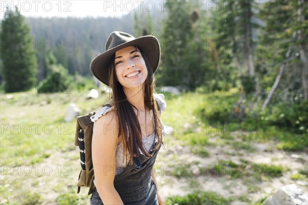 Portrait of woman hiking in forest