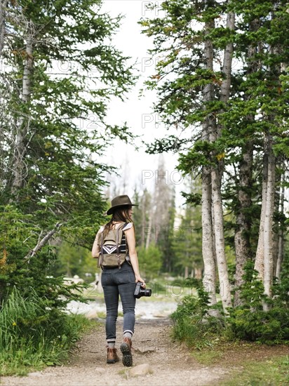 Woman hiking in forest