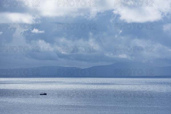 Ireland, County Donegal, Fishing boat on Donegal Bay seen from Wild Atlantic Way