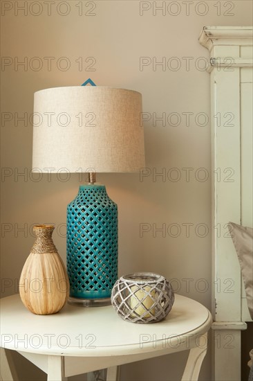 Lamp on table in bedroom