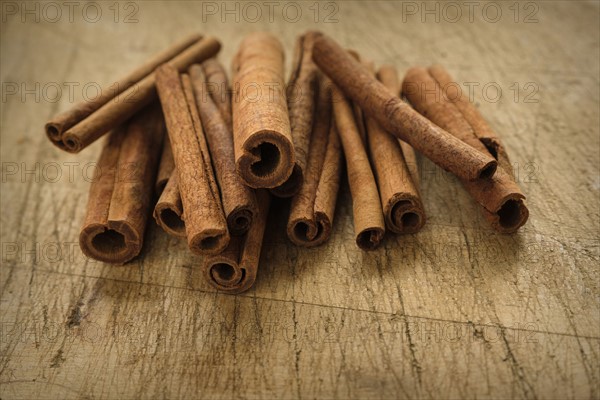 Cinnamon sticks on wooden table