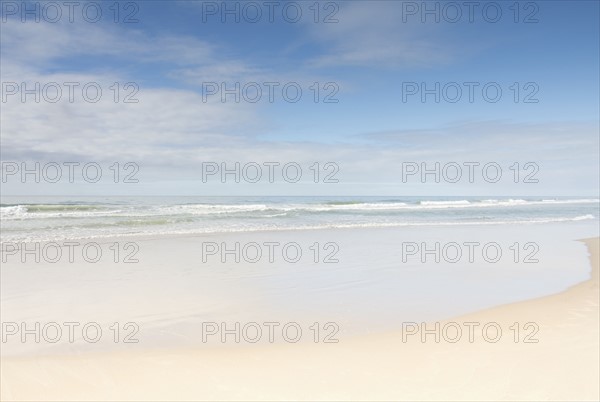 Empty beach on sunny day