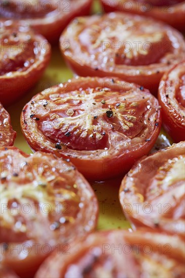 Cooked tomatoes in olive oil