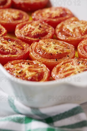 Cooked tomatoes in olive oil