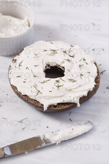 Bagel with cream cheese and dill