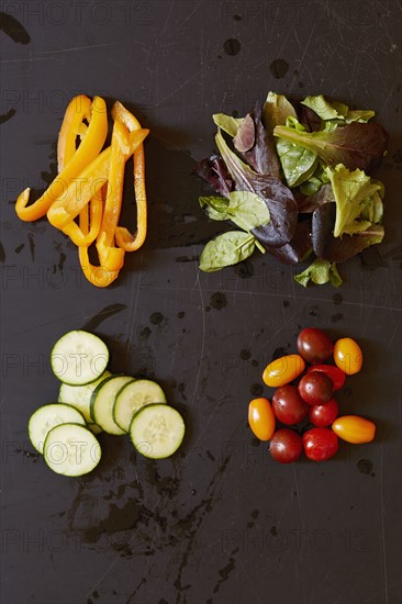 Yellow pepper, tomatoes, cucumber and greens