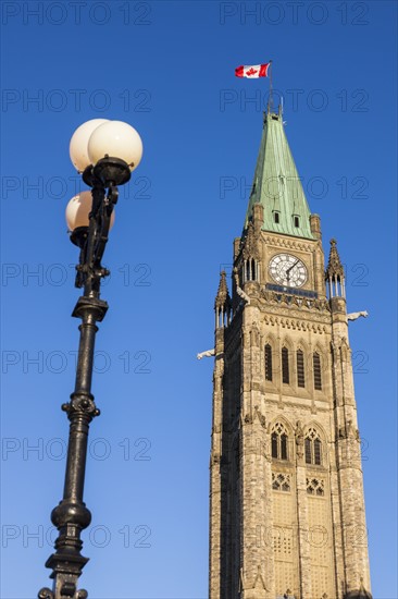 Canada, Ontario, Ottawa, Peace Tower and street light against clear sky