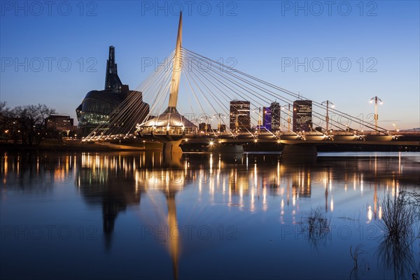 Canada, Manitoba, Winnipeg, Red river reflecting Esplanade Riel Bridge