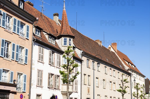 France, Grand Est, Colmar, Clear sky over townhouses