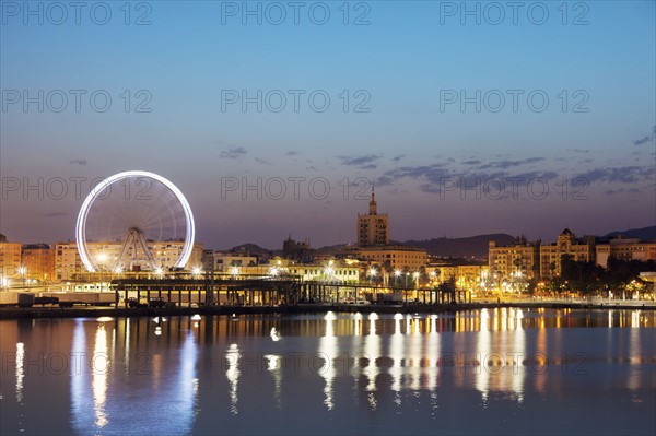 Spain, Seville, Andalusia, Waterfront at dusk