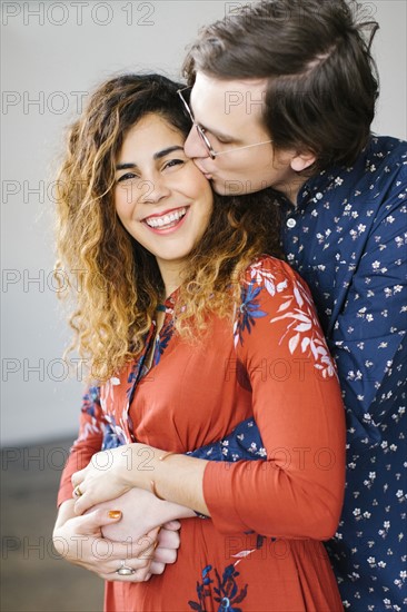 Portrait of kissing couple