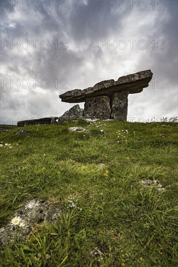 Ireland, Clare County, Burren, Poulnabrone Dolmen under overcast sky