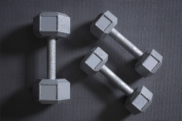 Dumbbells on grey background