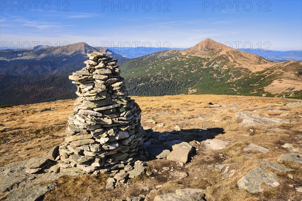 Ukraine, Zakarpattia region, Rakhiv district, Carpathians, Chornohora, Landscape with mountain Hoverla, mountain Turkul, and stone stack