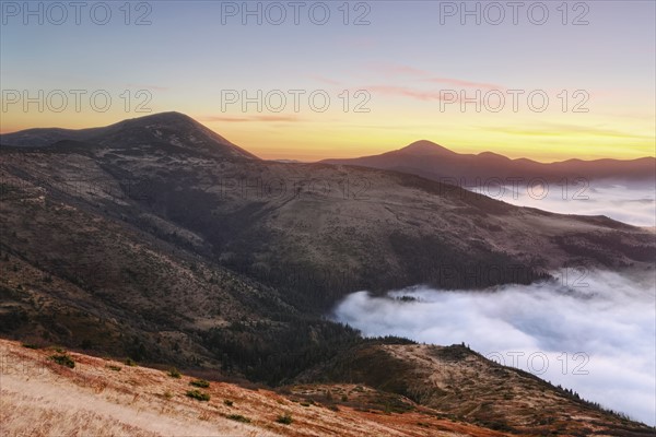 Ukraine, Zakarpattia region, Rakhiv district, Carpathians, Chornohora, Chornohora ridge, Sunrise over mountain Sheshul