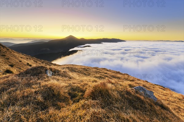 Ukraine, Zakarpattia region, Rakhiv district, Carpathians, Chornohora, mountain Hoverla, mountain Petros, Landscape with mountains and clouds