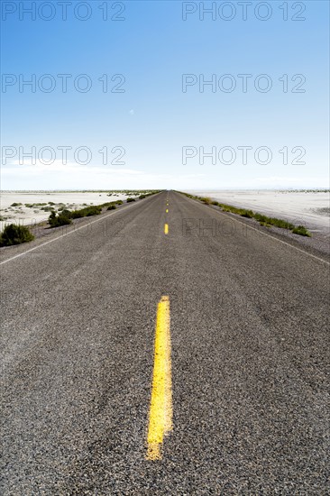 USA, Utah, Wendover, Bonneville Salt Flats, Blue sky over empty road