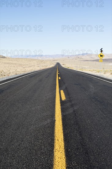 USA, Nevada, Highway 50, Clear sky over empty road