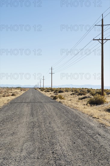 USA, Nevada, Highway 50, Electricity pylons next to road